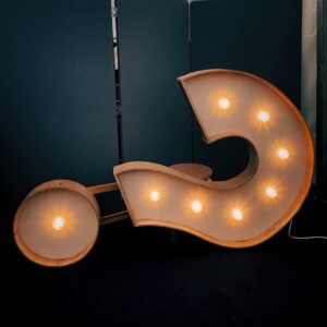 question mark on its side for flipping the script