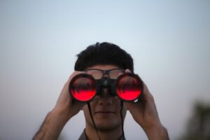looking through binoculars finding a job when you're unemployed