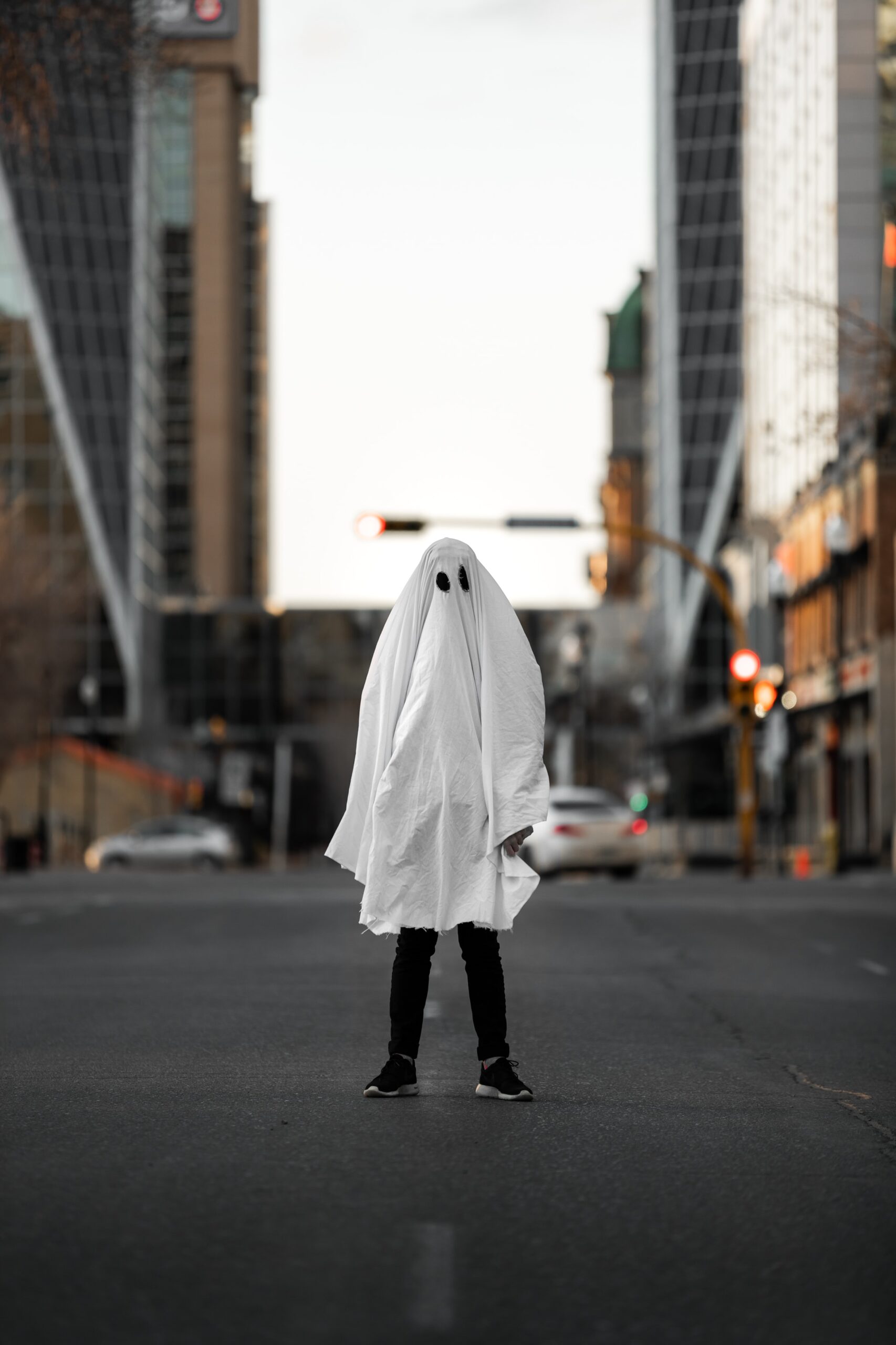 ghosted candidate standing on city street